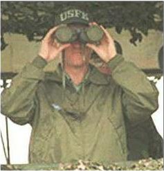 Clinton With Capped Binoculars