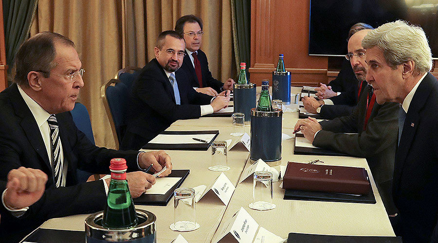 Russian Foreign Minister Sergey Lavrov (L) and U.S. Secretary of State John Kerry