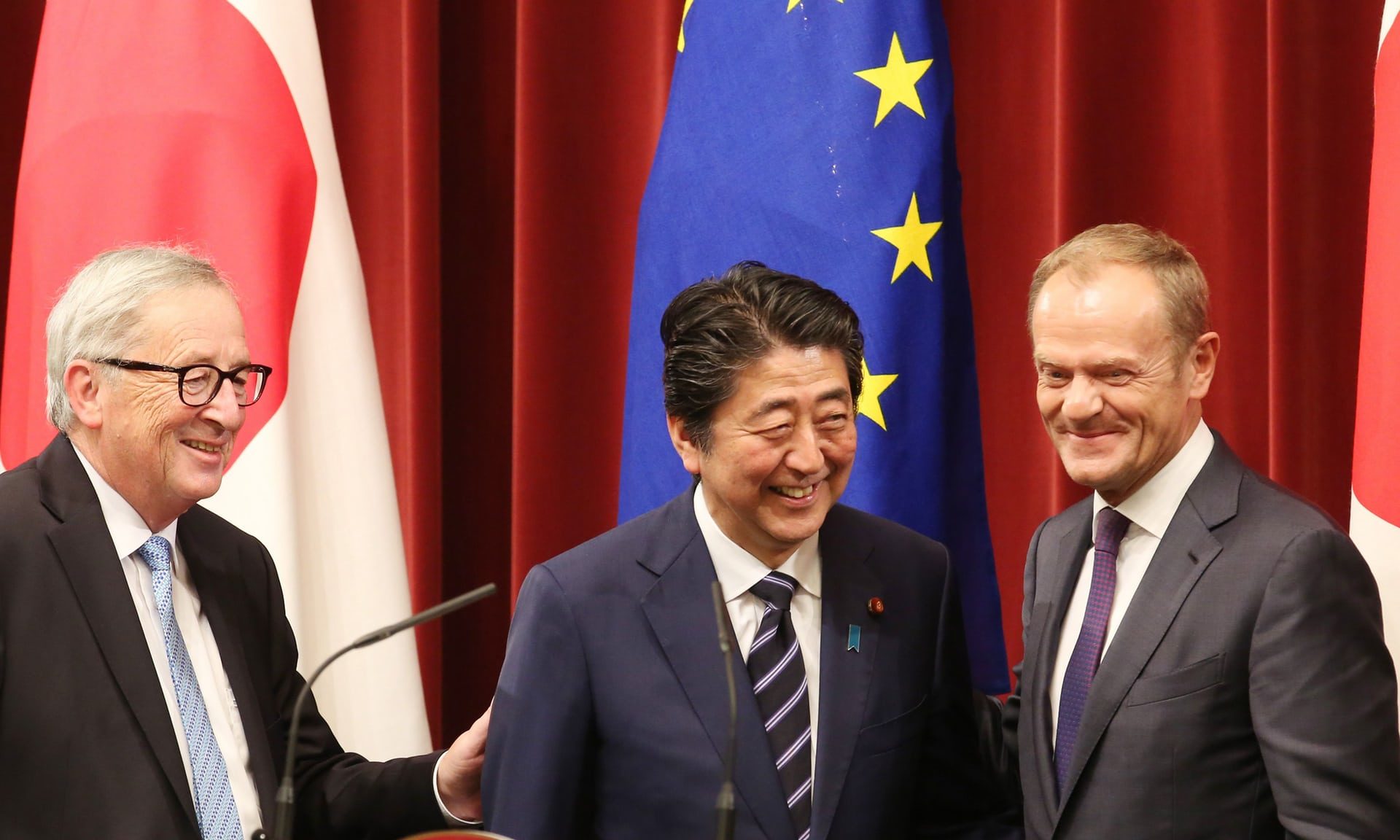 Jean-Claude Juncker (left), Shinzo Abe (centre) and Donald Tusk