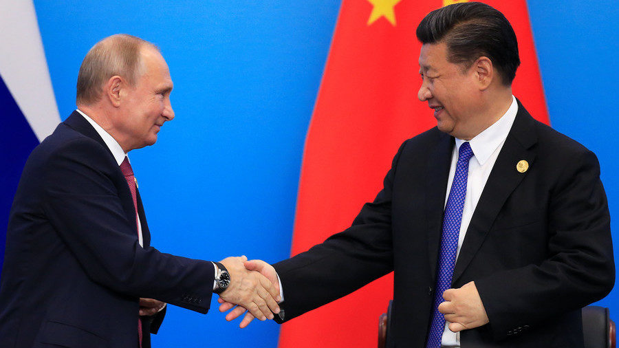 Vladimir Putin meets Xi Jinping