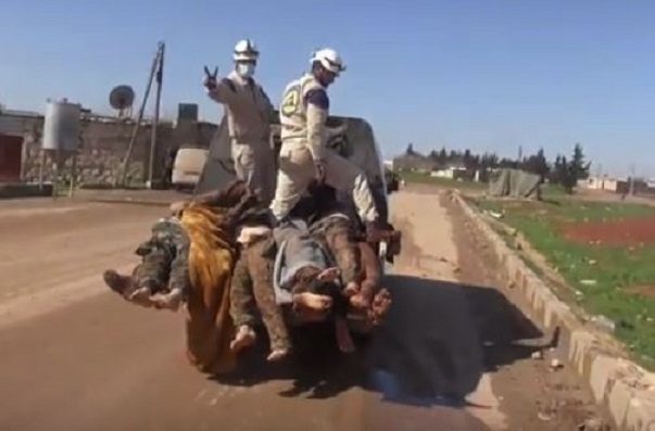Leševi sirijskih vojnika i znak pobjede Bijelih kaciga