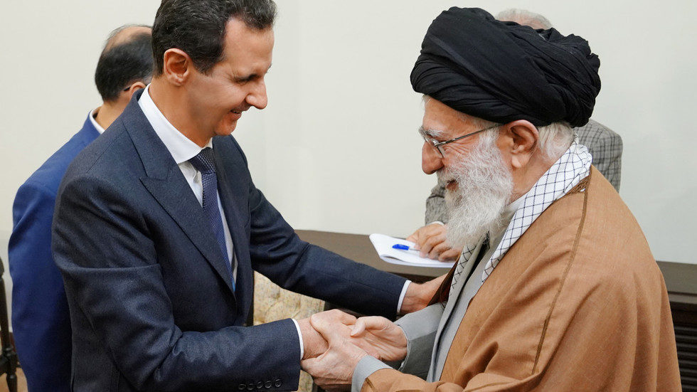 Klikni za povećanje assad rouhani