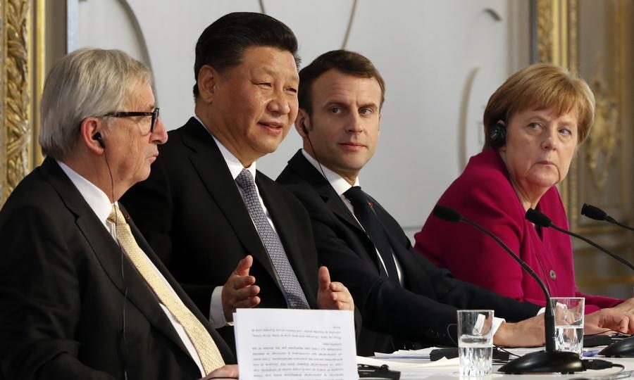European Commission President Jean-Claude Juncker (left), Chinese President Xi Jinping, French President Emmanuel Macron and German Chancellor Angela Merkel at the Elysee presidential palace in Paris on March 26, 2019.