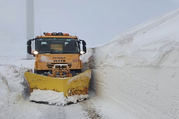 Giant snow drifts pictured at Scots wind farm