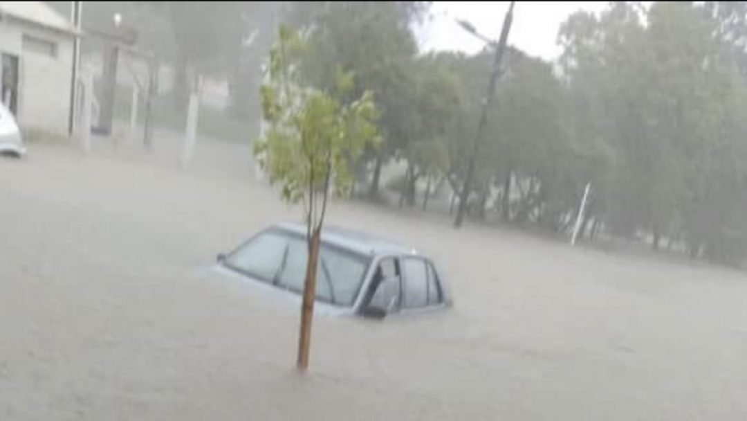Cars submerged in the streets of Rocha city
