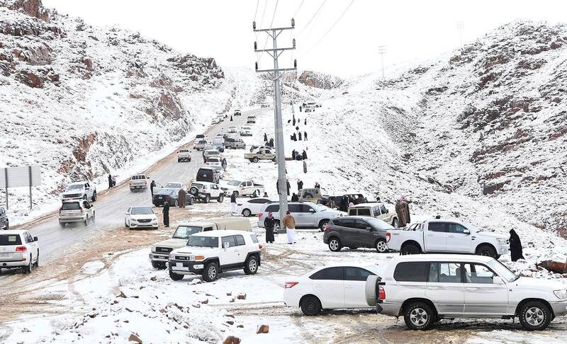 Vehicles line the road to Jebel Al Lawz as hundreds of people visit the area.