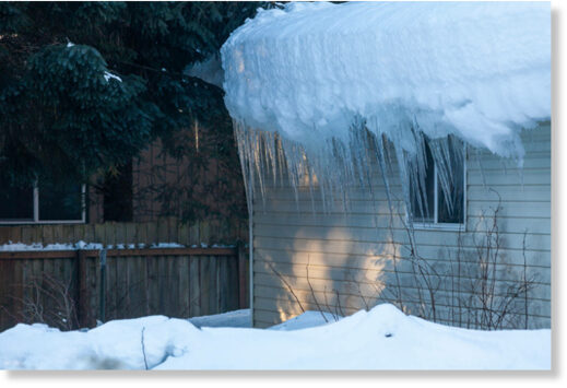 Klikni za povećanje Ice hangs off of Stan Savland’s Lemon Creek home on Tuesday, Jan. 4, in Juneau.