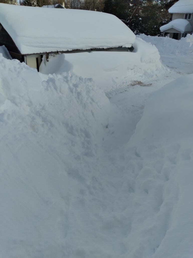 Painesdale, Mich. resident Ronnie Jackson snapped this photo of his shed, which he says is completely buried by snow following a record-breaking storm. Image provided by Ronnie Jackson.