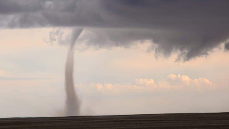 An apparent landspout tornado on the ground south of Keller, Sask. reported on May 17, 2022.
