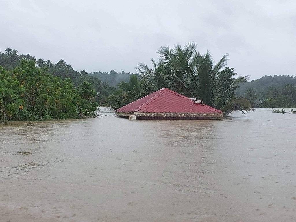 SWAMPED. A house is almost completely submerged in floodwaters in Can-avid town, Eastern Samar.