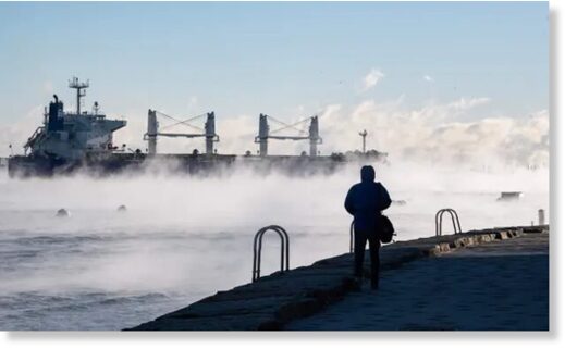 Steam rises from Boston Harbor as