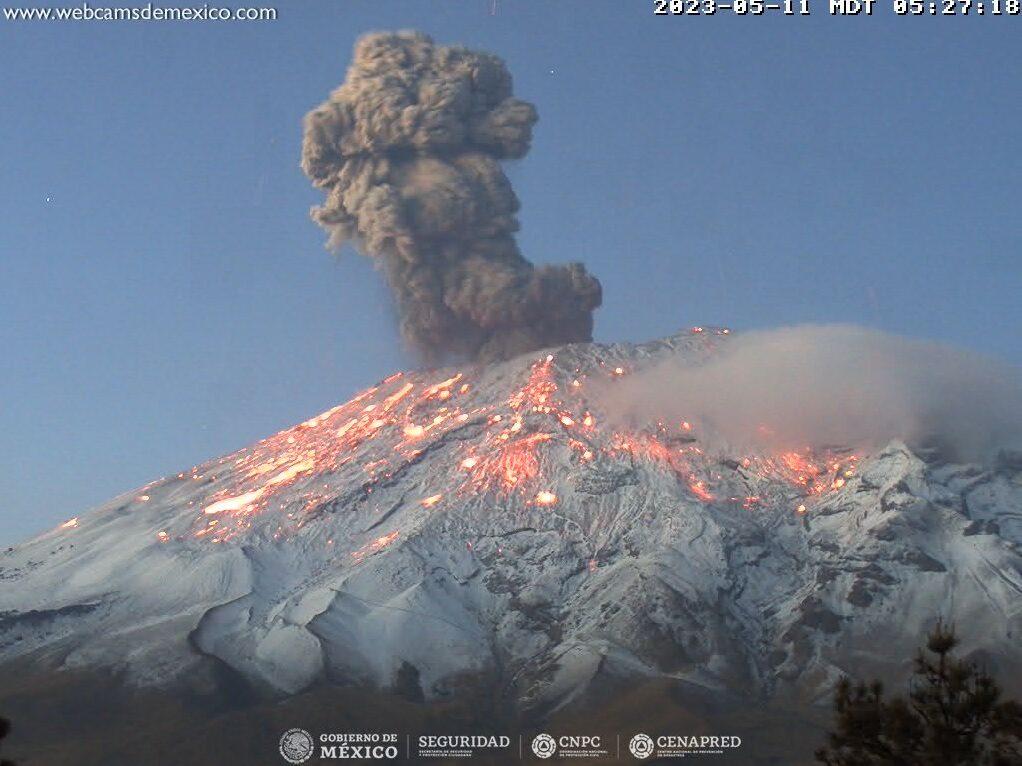 Incandescent bombs, resulting from the eruption, spread over upper snow-covered flanks at Popocatépetl volcano