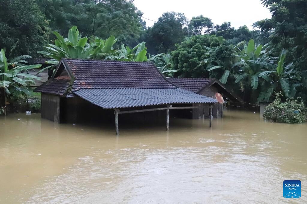 This photo taken on Sept. 27, 2023 shows a house in flood water in Vietnam's central Nghe An province