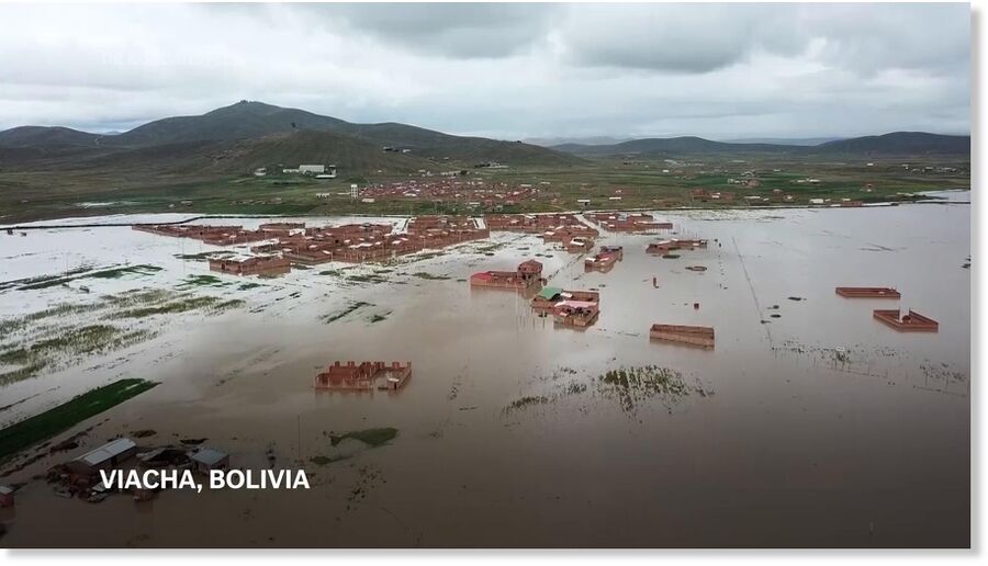 Crops and homes in the Bolivian highlands flooded by heavy rain
