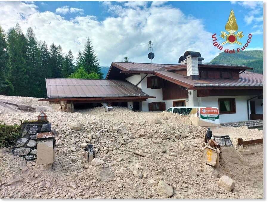 The fire department rushed to free trapped residents of the alpine village of Borca di Cadore in Italy.
