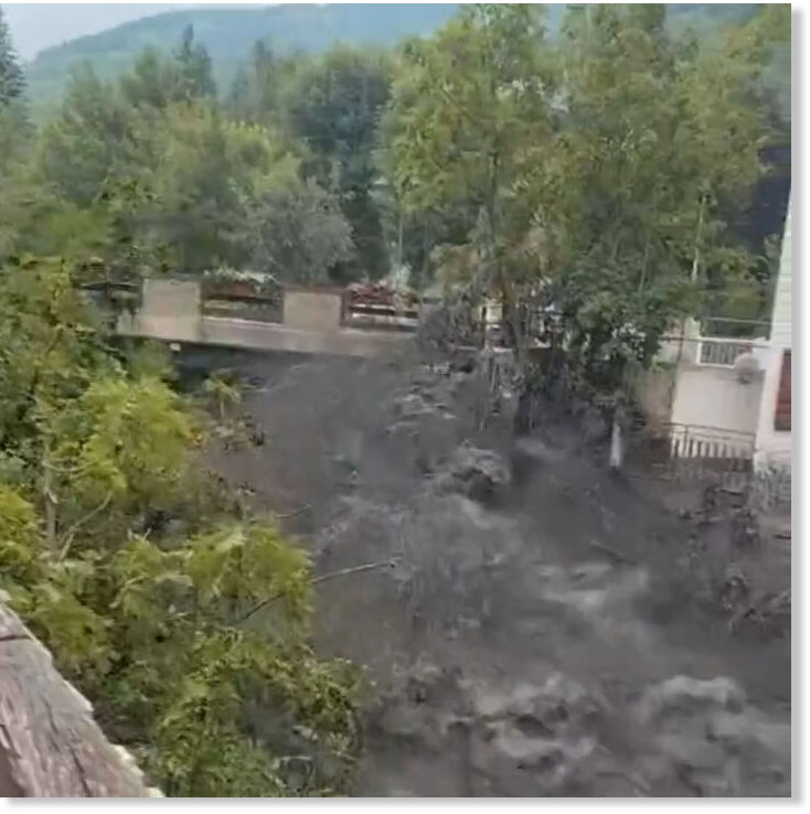 Flash floods in northwestern Italy left one dead and over a dozen trapped