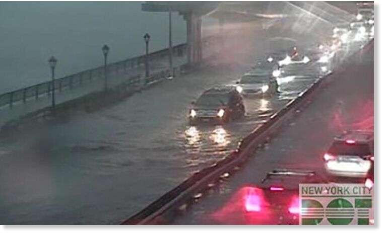 FDR Drive along the East River flooded, forcing drivers to slowly inch down the road.