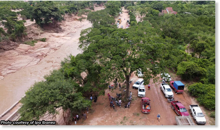 A drone view shows flooded areas that left communities isolated after torrential rain in the community of El Torno, in Santa Cruz region, Bolivia, December 14, 2025.