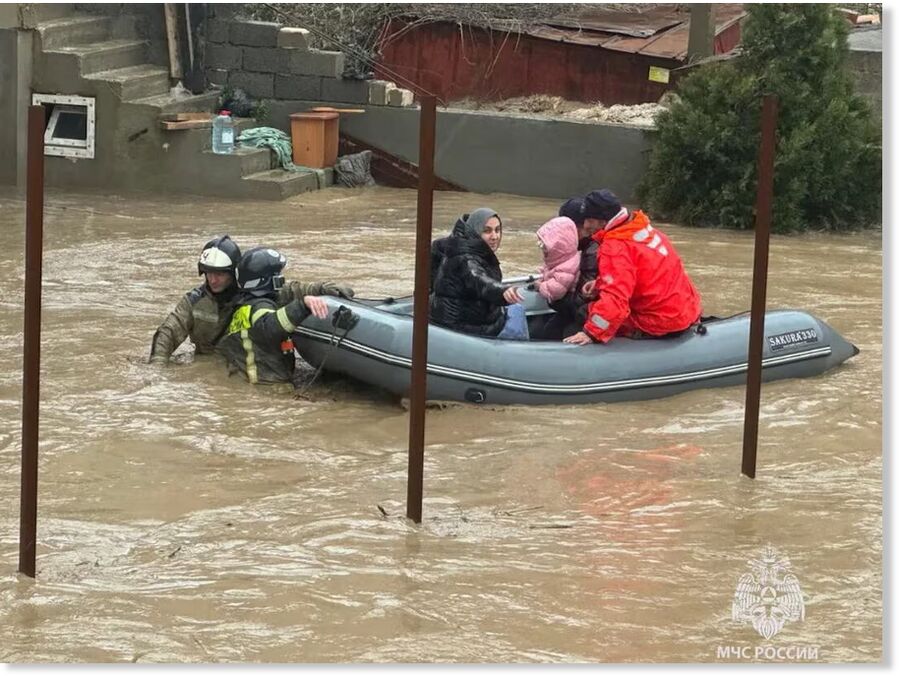 Emergency specialists evacuate residents from a flooded district in the city of Makhachkala in the Caucasus region of Dagestan, Russia, in this picture released March 28, 2026. Emergency Ministry of Russia/Handout via REUTERS