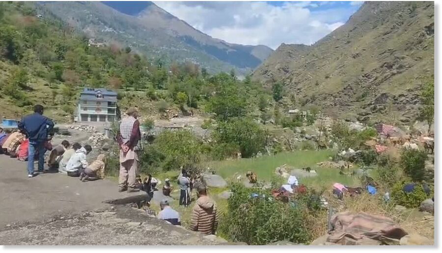 Locals gather at the spot where lightning strike killed 61 goats and sheep of a nomad family in Bani in J&K's Kathua
